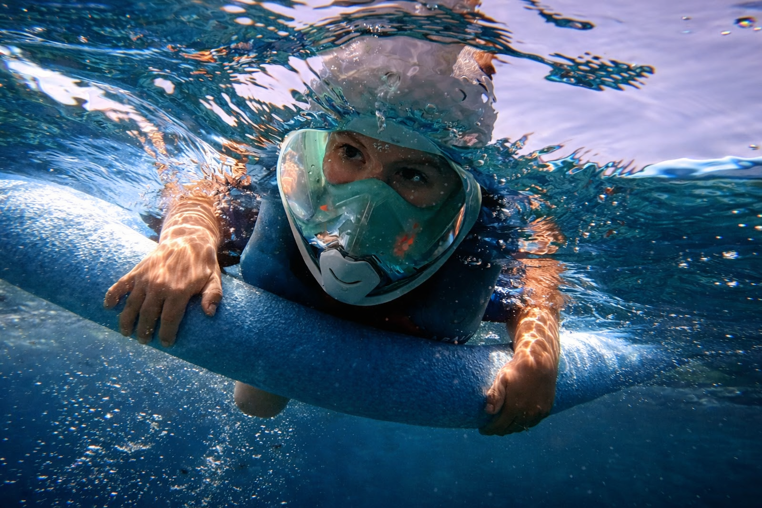 Underwater snorkeling experience in crystal clear water in Puerto de Mogan Gran Canaria