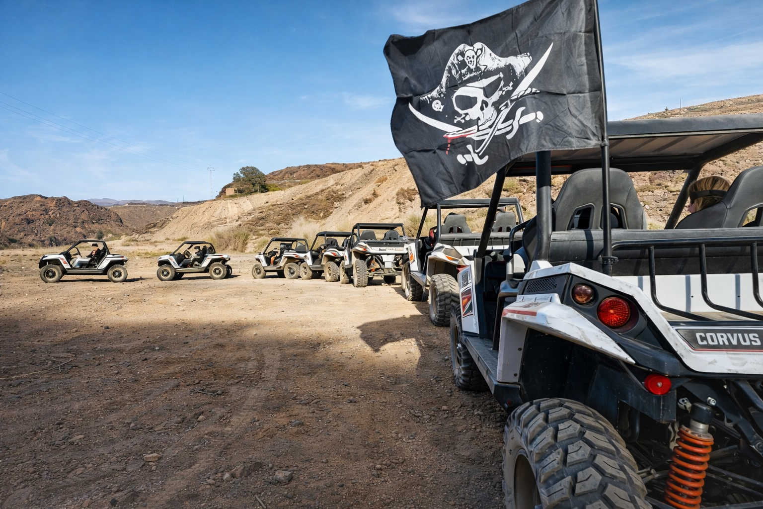 Group of off-road buggies lined up in Gran Canaria during a guided adventure tour across volcanic landscapes